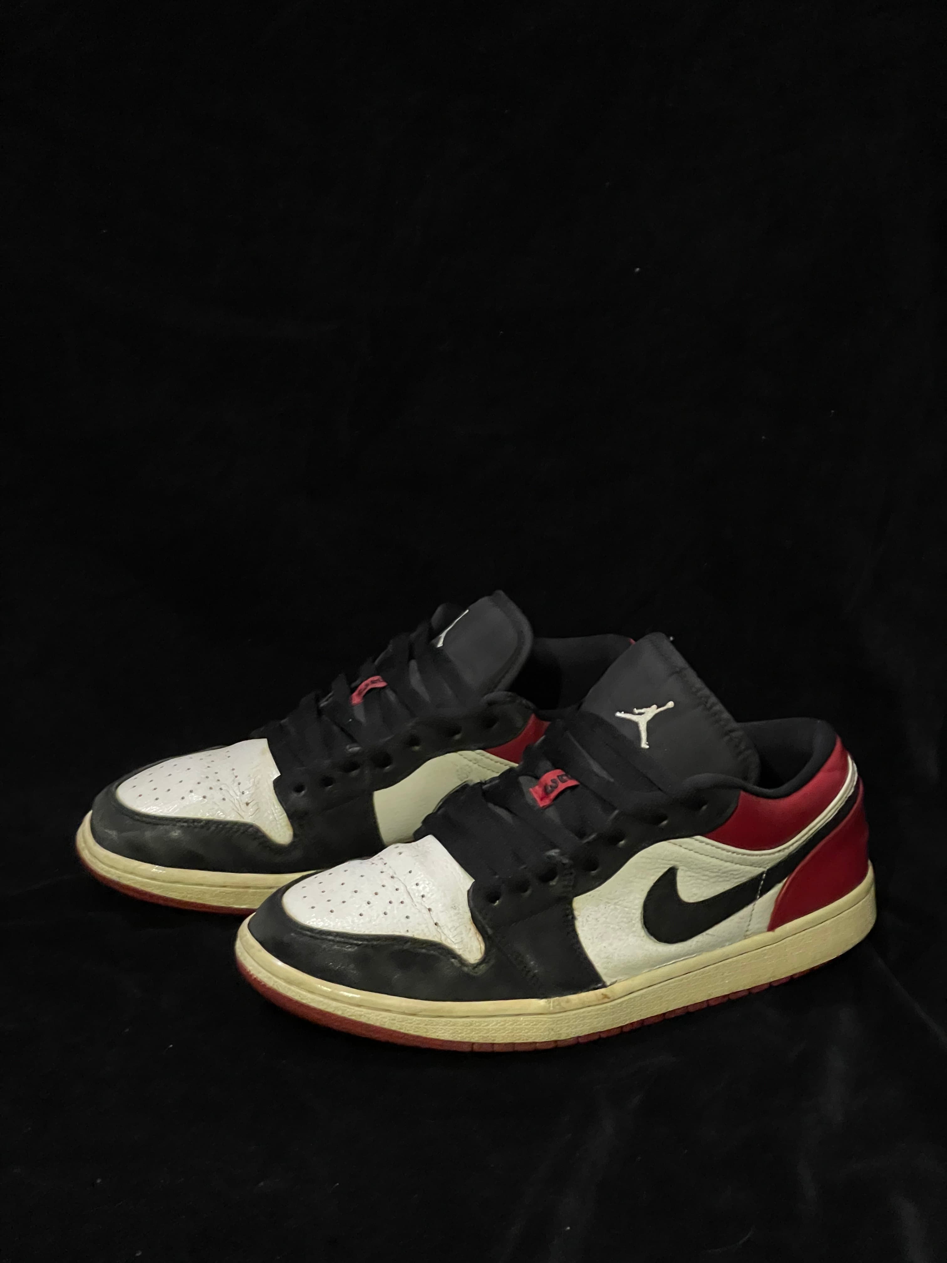 Jordan 1 low black toe