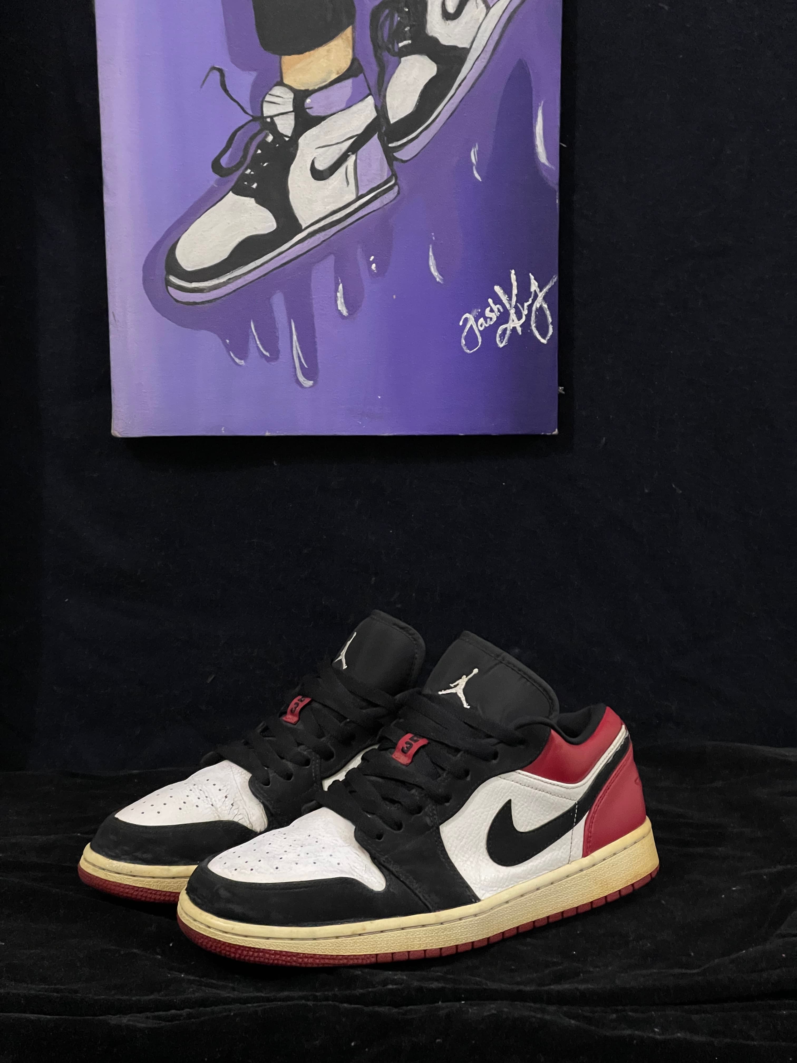 Jordan 1 low black toe